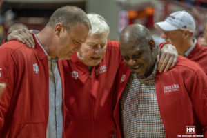 Bob Knight puts former players around arms to embrace them