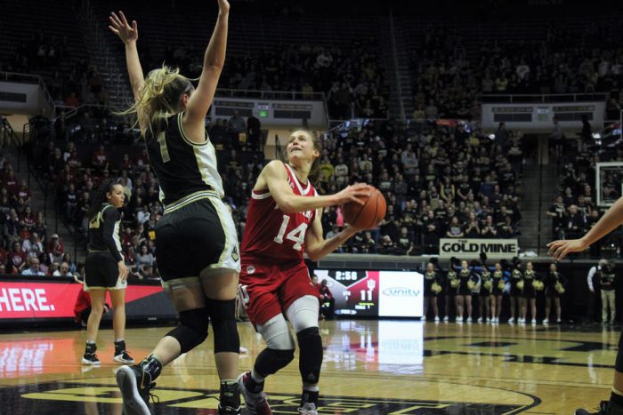 Ali Patberg attempts to shoot the ball over Purdue defender